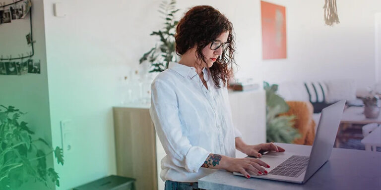 Female on her laptop exploring the faqs for multiple small business bank accounts